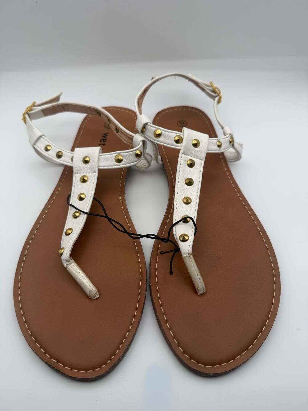 Wet Seal Women's White T-Strap Flat Sandals with Gold Studded Detail